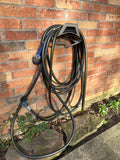 Garden hose with spray nozzle