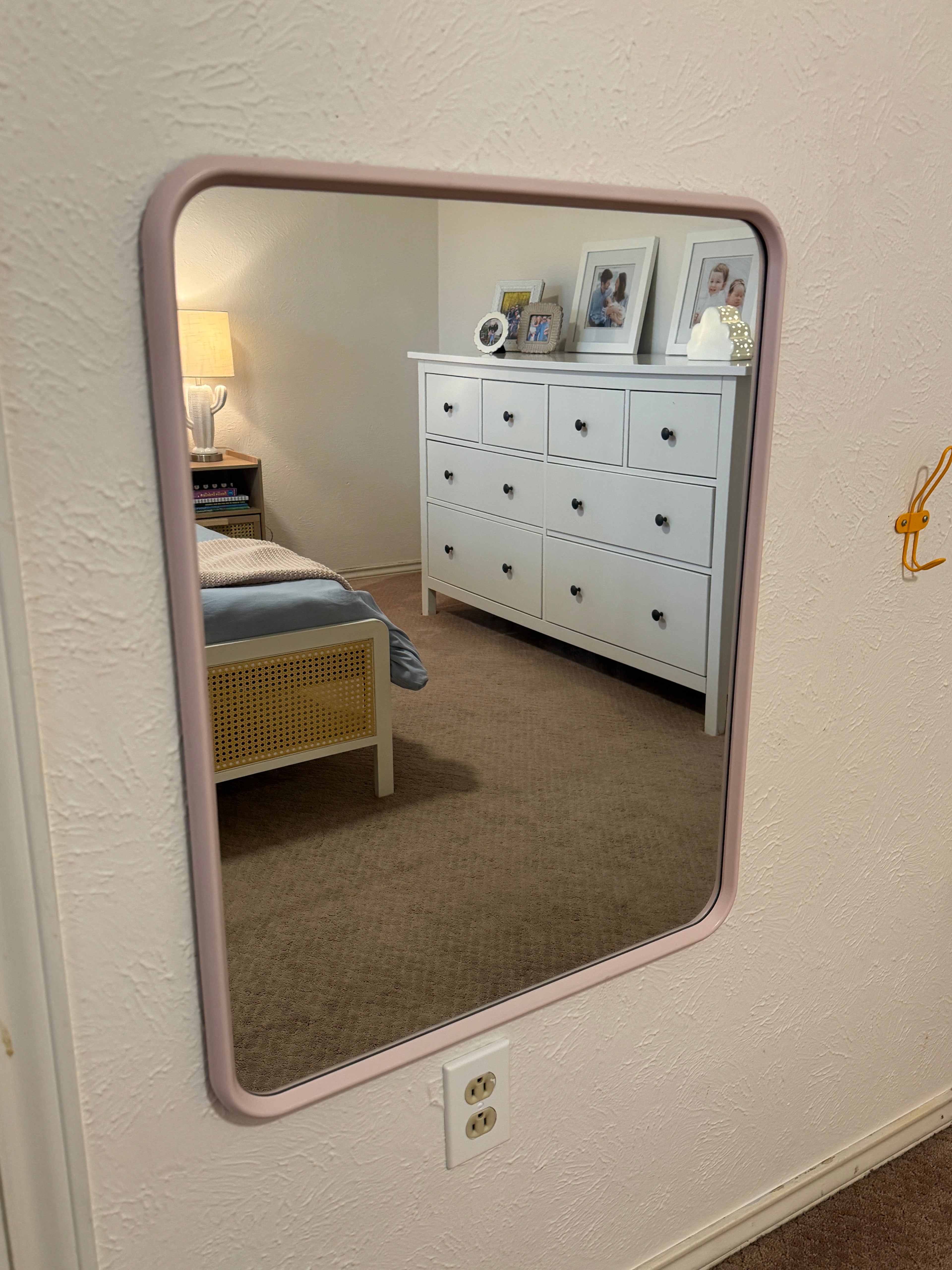 Mirror with light pink frame