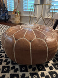 Faux leather ottoman pouf