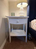 White bedside table